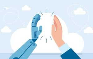 Businessman hand high-fiving robot hand